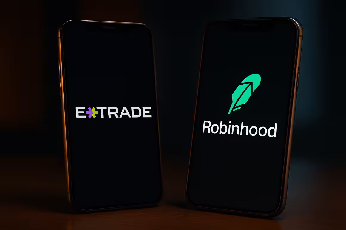 Photorealistic image comparing E*TRADE vs. Robinhood, showing two smartphones with their logos side by side under bright lighting, symbolizing competition between online trading platforms.